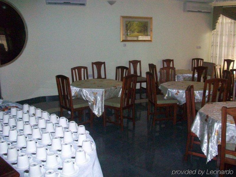 东门酒店 阿克拉 餐厅 照片